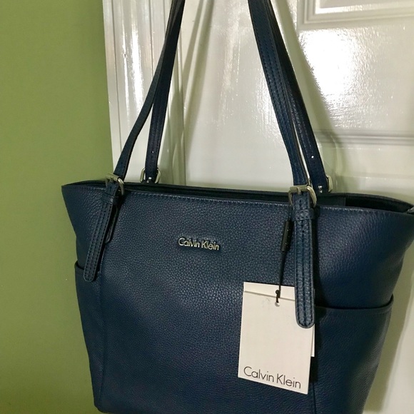 Calvin Klein Handbags - NWT Calvin Klein navy blue pebbled leather tote